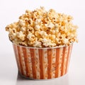 Bucket full of popcorn isolated on a white background. Royalty Free Stock Photo