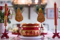 A bucket of incense marked with chinese alphabet represent prosperity. the ritual was made in chinese new year.