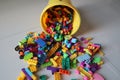 A bucket of Scattered Legos on the Floor Royalty Free Stock Photo