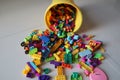 A bucket of Scattered Legos on the Floor Royalty Free Stock Photo