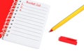 Bucket list notebook with yellow pen and red cap. Mock up, template close up Royalty Free Stock Photo