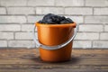 bucket with lumps of coal Royalty Free Stock Photo