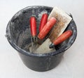 Bucket with masonry tools Royalty Free Stock Photo