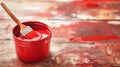 Bucket with red paint brush on plank wood floor background. Home improvement renovation interior decoration concept