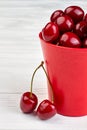 Bucket with ripe sweet cherries. Royalty Free Stock Photo