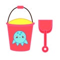 Bucket with sand and shovel. Beach toys for children Royalty Free Stock Photo