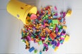 A bucket of Scattered Legos on the Floor Royalty Free Stock Photo