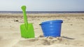 Bucket and shovel on the beach Royalty Free Stock Photo