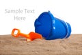 An bucket and shovel on the beach with copy space Royalty Free Stock Photo