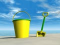 Bucket and spade on the beach Royalty Free Stock Photo