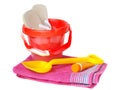 Bucket,spade,towel sun-cream and flip-flops Royalty Free Stock Photo