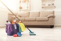 Bucket with sponges, chemicals bottles and mopping stick. Royalty Free Stock Photo