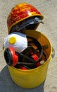 Bucket with tools and construction safety equipment. Royalty Free Stock Photo