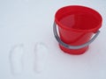 A bucket of water on the snow