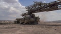 Bucket wheel excavator in a lignite open pit mining basin in Ptolemaida, Northern Greece Royalty Free Stock Photo