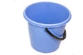 A bucket on a white background. Plastic blue bucket on a white background. Bucket for washing floors. Royalty Free Stock Photo