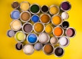 Buckets full of rainbow colored oil paint Royalty Free Stock Photo
