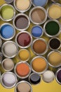 Buckets full of rainbow colored oil paint Royalty Free Stock Photo