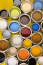 Buckets full of rainbow colored oil paint Royalty Free Stock Photo