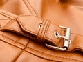 Buckle detail on a leather jacket