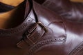 Buckle detail of a pair of classic brown Brogue shoes