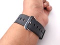 Buckles and black rubber straps watch on someone hand Royalty Free Stock Photo