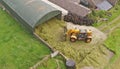 Buckraking silage in Ireland crop, grass Royalty Free Stock Photo