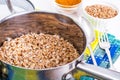 Buckwheat boiled in a metal pot Royalty Free Stock Photo