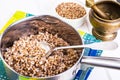 Buckwheat boiled in a metal pot Royalty Free Stock Photo