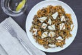 Buckwheat with carrot and chopped adygei cheese