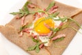 Buckwheat crepe with fried egg Royalty Free Stock Photo