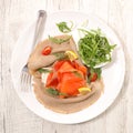 Buckwheat crepe with smoked salmon Royalty Free Stock Photo