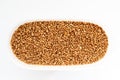 Buckwheat food in a container on white background