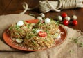 Buckwheat noodles with quail eggs, tomatoes and microgreen. Selective focus Royalty Free Stock Photo