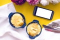 Blank screen mobile phone and buckwheat porridge with cheese and egg. Royalty Free Stock Photo