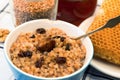 Buckwheat porridge in bowl,seeds and honeycomb.