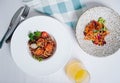 buckwheat with seafood, oyster, tomato and herbs in a deep plate side view Royalty Free Stock Photo