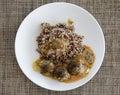 Buckwheat with small meat balls Royalty Free Stock Photo
