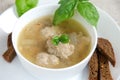 Buckwheat soup meatballs white plate Royalty Free Stock Photo