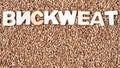 Buckwheat texture with wooden word BUCKWHEAT..