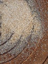 Buckwheat was poured onto a steel slab of a manhole with a radial pattern as food for birds.