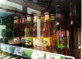 Bucuresti, Romania. August, 10, 2019- photograph taken through the window at `Strongbow` cider bottles and `Desperados` beer