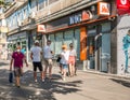 Bucuresti/Romania - 08.18.2020: People waiting in line in front of a ING Bank branch respecting the social distancing to prevent