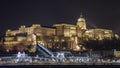 Buda Castle by the Danube river illuminated at night in Budapest, Hungary Royalty Free Stock Photo