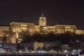 Buda Castle by the Danube river illuminated at night in Budapest, Hungary Royalty Free Stock Photo