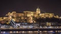 Buda Castle by the Danube river illuminated at night in Budapest, Hungary Royalty Free Stock Photo