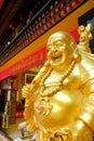 Statue of Budai or `Laughing Buddha` at Thekchen Choling, Tibetan Buddhist temple, Singapore Royalty Free Stock Photo