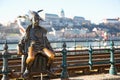 Budapest Attractions. Little Princess perched by the tram rails on the Pest, with Buda Castle in background, landmark of Hungary c