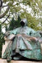 Budapest, B, Hungary - August 19, 2023: Statue of Anonymus is a hooded writing with a pen which if touched brings good luck