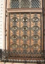 Budapest, B, Hungary - August 19, 2023: wooden door with faces at St Stephen s Basilica in Budapest Hungary